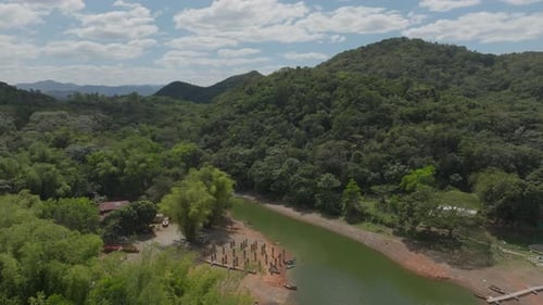 Fish farm along river, Hatillo dam in Dominican Republic. Aerial forward