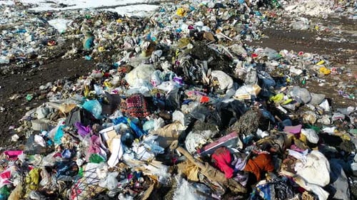 Aerial view garbage, lots of plastic bags, litter and junk.