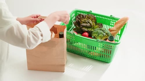 Food Shopping Delivery Green Basket with Goods Products on White Background Online Shop