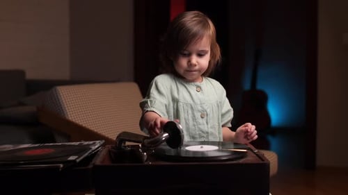 Little Girl Listening to Music on Vintage Record Player