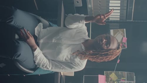 Vertical Video Professional Detective Examining Evidence on Hologram