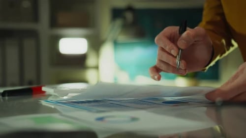 Financial Analyst Working with Charts and Graphs