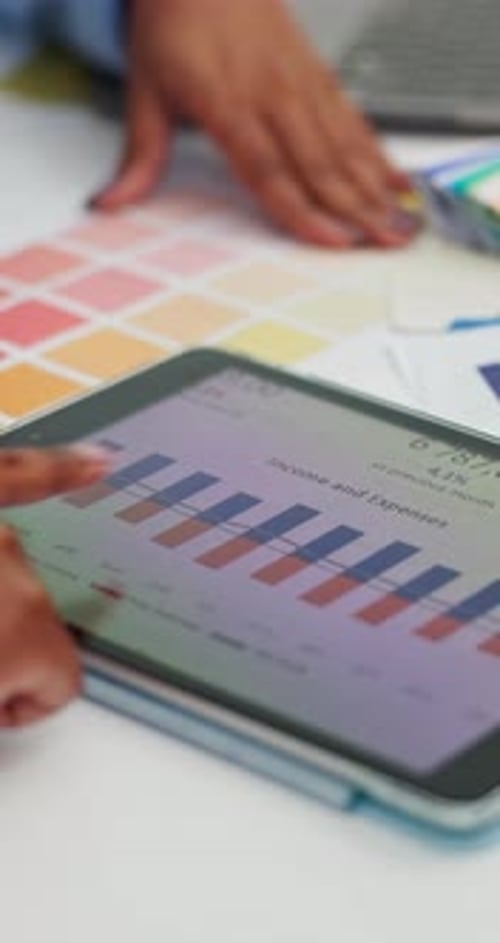 Tablet, meeting and data with hands of business people for planning, graph and budget charts