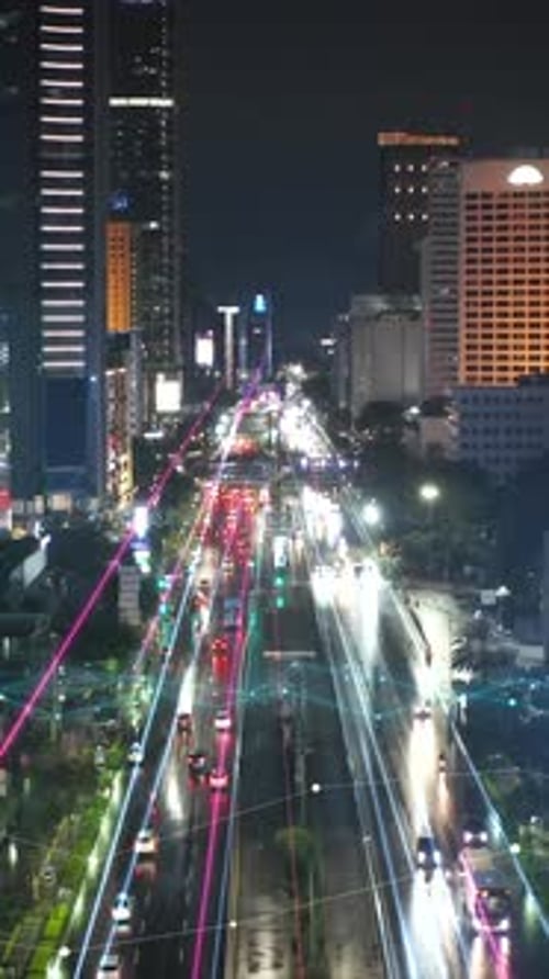 Aerial Descending Footage of Modern Urban Borough with High Rise Office Buildings and Multilane Road
