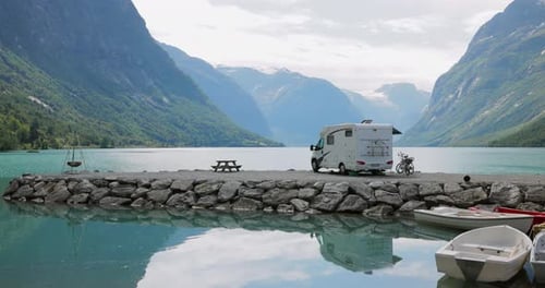 Family vacation travel RV, holiday trip in motorhome. Beautiful Nature Norway natural landscape.