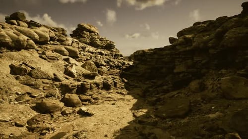 Moody Scene Showcasing Dramatic Rocky Outlines in Confined Gorge Under Muted Sky