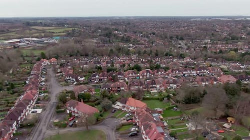 Soft moving drone shot of suburban area in England just outside London