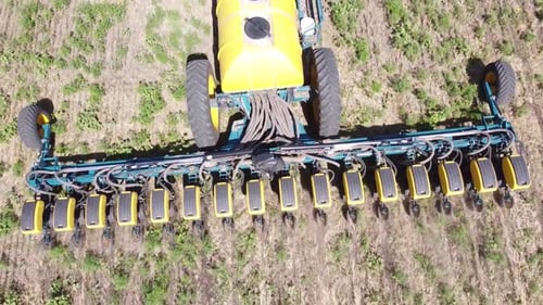 Blue Tractor O.A. Planting Canola On No Till Field