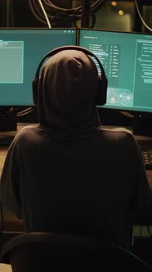 Hacker Working at Night on Computer