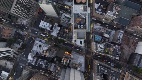Bird's Eye Views Showcase Manhattan's Streets and Rooftops of New York City at Dusk Capturing