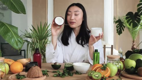 Blogger or Content Creator Asian Woman Preparing Natural Cosmetics at Home