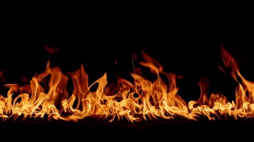 Abstract Flames Burning Brightly Against Black Background