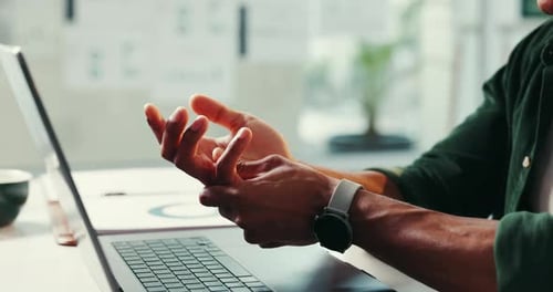 Hands, business and man with wrist pain in office from typing accident, arthritis crisis