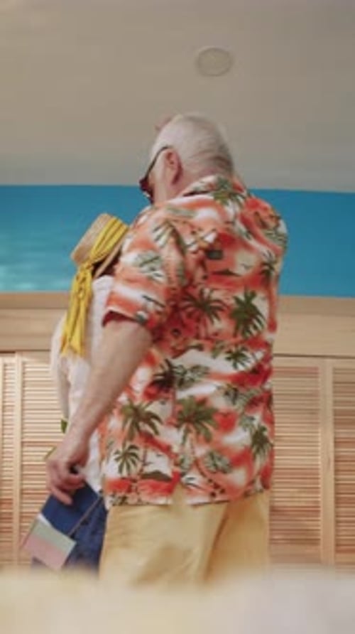 Senior Couple Dancing with Flags, Celebrating