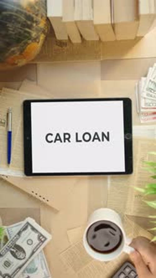 VERTICAL VIDEO OF CAR LOAN DISPLAYING ON FINANCE TABLET SCREEN