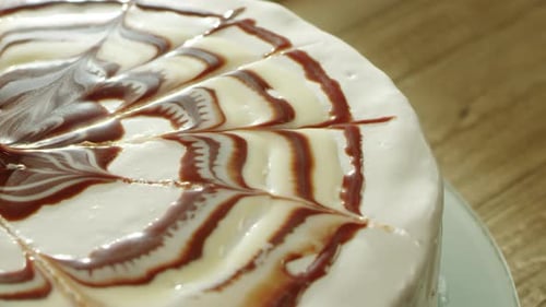Delicious cream cake with chocolate drizzle, dessert