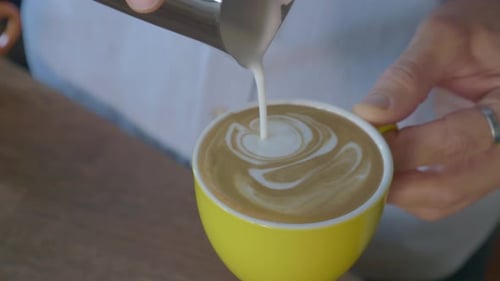 Adding Milk to Coffee to Make Latte Art
