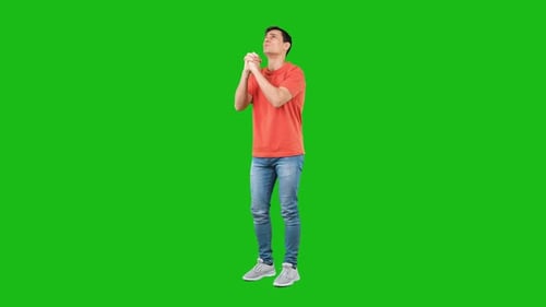 Man Kneeling in Prayer on Green Screen