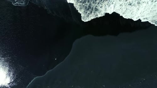 Aerial Top View of Black Sand Beach with Big Waves