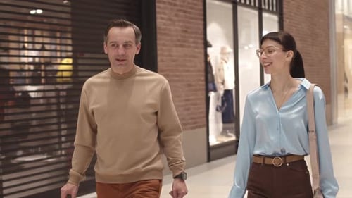 Couple Shopping Together in Shopping Mall