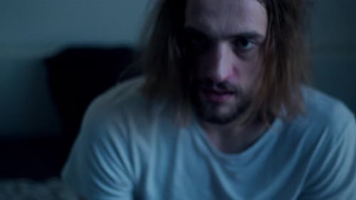 A Man Wakes Up Sweating From a Nightmare - Close Up