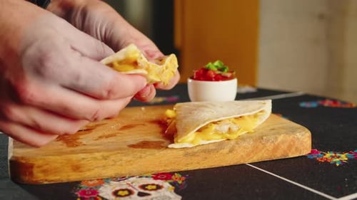 Close Up of Cheese Quesadilla Eating Traditional Mexican Food Tex Mex Cuisine