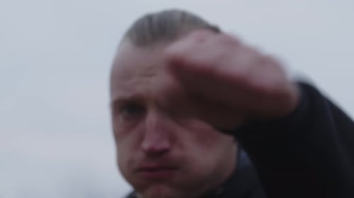 Athletic Man Boxing in Close Up, Training