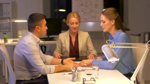 Business Team Meeting at an Office Table