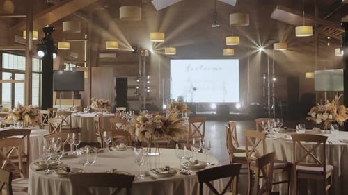 A Beautifully Decorated Banquet Hall Set for a Wedding Reception