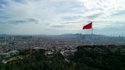 Urban Cityscape Aerial View with Prominent Flag