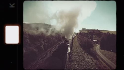 Vintage Steam Train Traveling Through Rural Landscape
