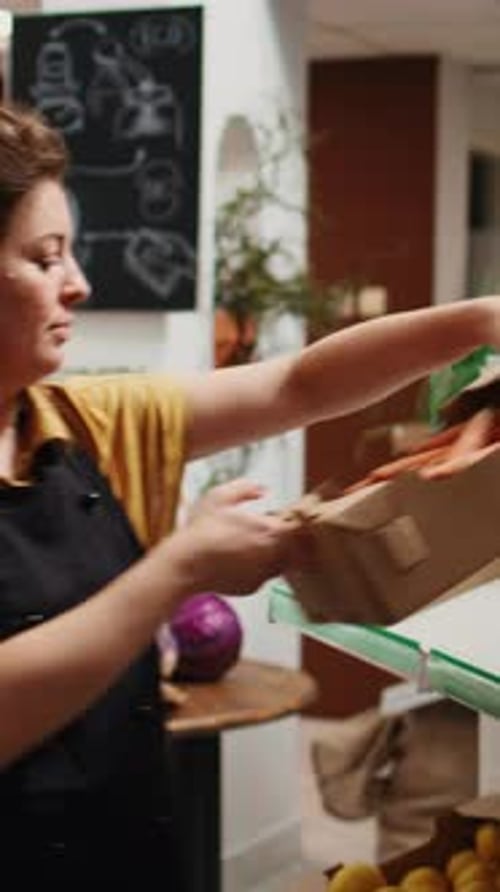 Vertical Video Bio Food Shop Vendor Helps Man with Info