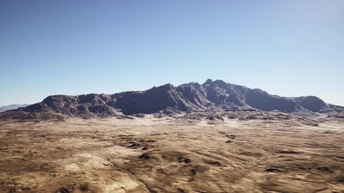 Crisp Midday Views of Expansive Barren Terrain and Rocky Horizon
