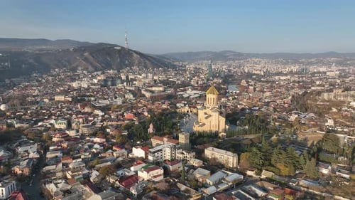 Drone view of Tbilisi city center featuring the Sameba Holy Trinity Cathedral, Georgia