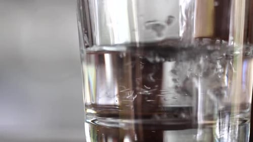 Water Pouring Into Glass