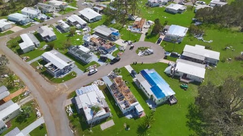 Severely Damaged Houses After Hurricane Ian in Florida Mobile Home Residential Area