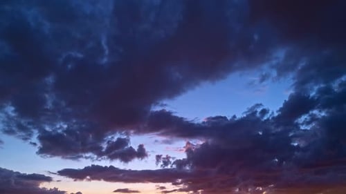 Dramatic Timelapse of Clouds and Colorful Sunset Sky