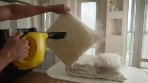 Steaming a Pillow with a Handheld Steamer