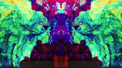 Red Blue And Yellow Ink Drops In The Water Reaction