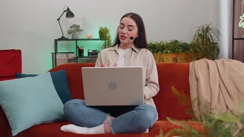 Young Woman Freelance Worker Call Center Support Service Operator Helpline Having Talk with Client