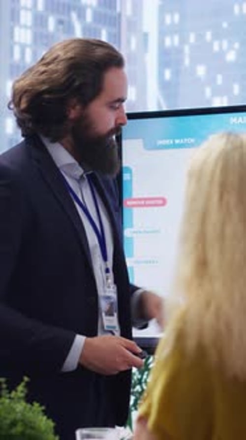 Vertical Video Financial Advisor Presents Detailed Stock Market Analysis to Clients