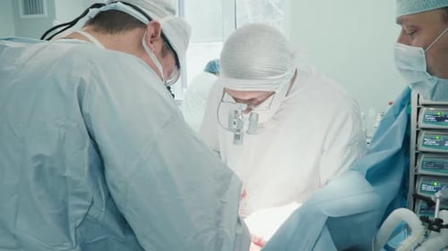 Medical Team Performing Operation in Hospital Operating Room