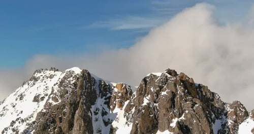 Snowy Mountain Peaks Under Blue Sky. British Columbia, Canada.