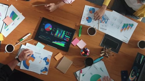 Diverse Team Hands Together in Corporate Meeting