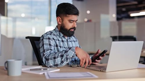 Tired Businessman Having a Headache at the Office Exhausted Man Taking Off Glasses