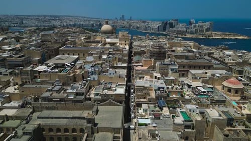 Ascending aerial view of Malta's capital city, Valletta
