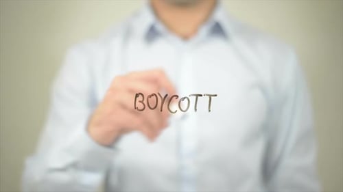Boycott Man Writing on Transparent Screen
