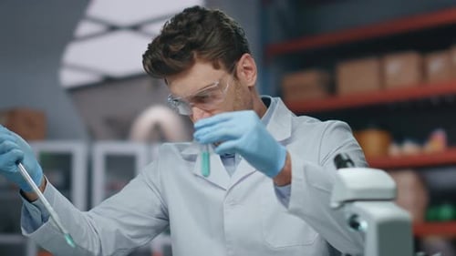 Professional Medic Making Experiment with Innovation Drugs in Clinic Close Up