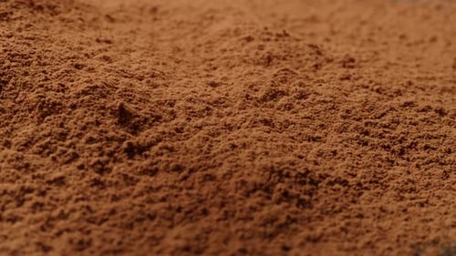 Cocoa Powder Texture on Wooden Background Spoon with Aromatic Coffee Cacao Chocolate Macro Close Up