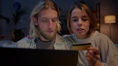 Couple Shopping Online, Successful Purchase, Laughing Together